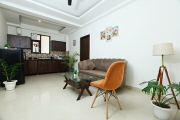 Living Room in 1 BHK Apartment at MVL IPark, Sector 15 – for Rent