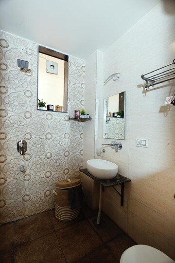Bathroom in 1 BHK Apartment at MVL IPark, Sector 15 – for Rent