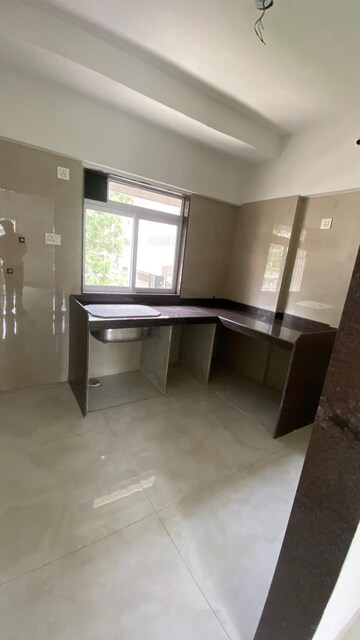 Kitchen in 2 BHK Apartment at Atul Blue Empire, Kandivali West – for Sale