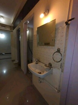Bathroom in 2 BHK Apartment at Powai Woods CHSL, Powai – for Rent