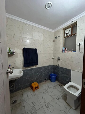 Bathroom in 2 BHK Apartment at Ambience Creacions, Sector 22 – for Rent