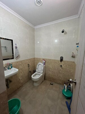 Bathroom in 2 BHK Apartment at Ambience Creacions, Sector 22 – for Rent