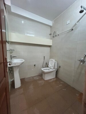 Bathroom in 1 RK Apartment at Ambience Creacions, Sector 22 – for Rent