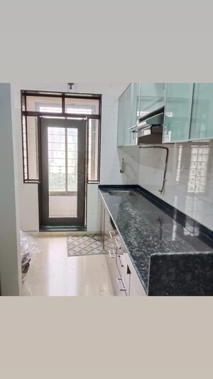 Kitchen in 3.5 BHK Apartment at Siddhachal Apartment 8, Vasant Vihar – for Rent