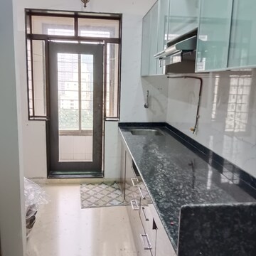 Kitchen in 3.5 BHK Apartment at Siddhachal Apartment 8, Vasant Vihar – for Rent
