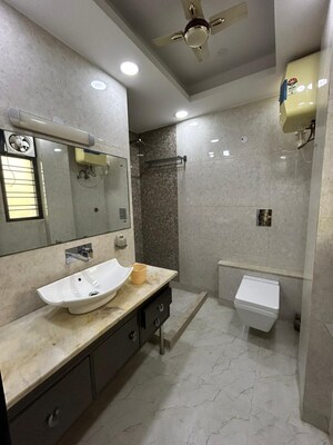 Bathroom in 2 BHK Apartment at Boutique Residential Apartments C-220, Malviya Nagar – for Sale