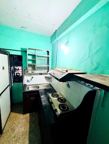 Kitchen in Studio Apartment at Acoi Village – for Sale