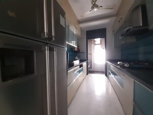 Kitchen in 4 BHK Apartment at Oberoi Realty Woods, Goregaon East – for Rent