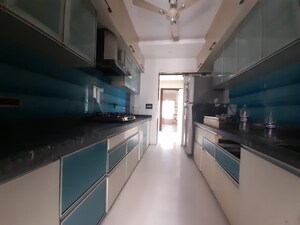 Kitchen in 4 BHK Apartment at Oberoi Realty Woods, Goregaon East – for Rent