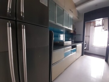 Kitchen in 4 BHK Apartment at Oberoi Realty Woods, Goregaon East – for Rent