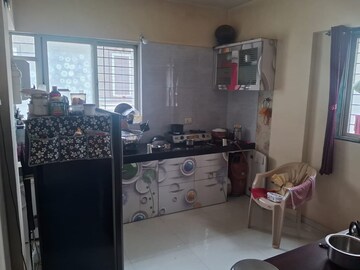 Kitchen in 1 BHK Apartment at Mangalmurti Apartments, Vishal Nagar – for Sale