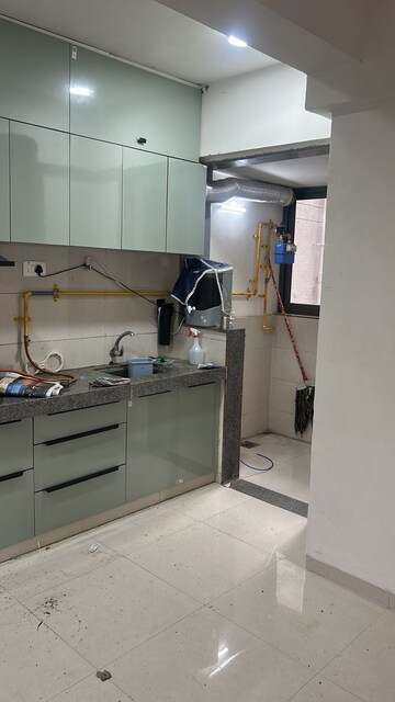 Kitchen in 3 BHK Apartment at Shilp Revanta, Shela – for Rent
