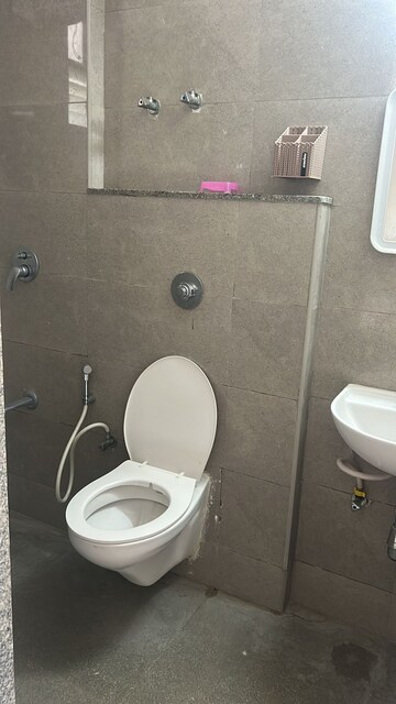 Bathroom in 3 BHK Apartment at Shilp Revanta, Shela – for Rent