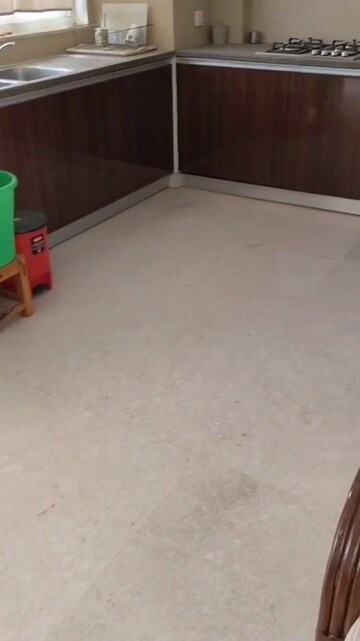 Kitchen in 3.5 BHK Apartment at Puri Diplomatic Greens Phase I, Sector 111 – for Sale