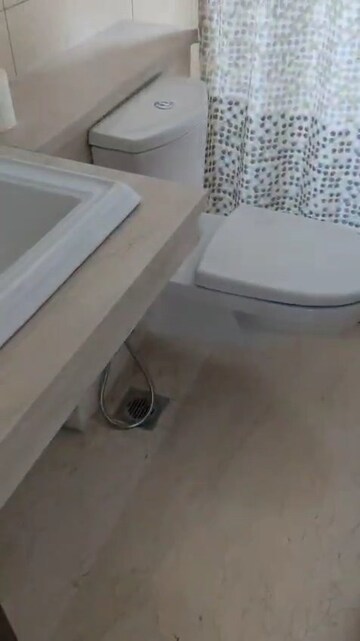 Bathroom in 3.5 BHK Apartment at Puri Diplomatic Greens Phase I, Sector 111 – for Sale