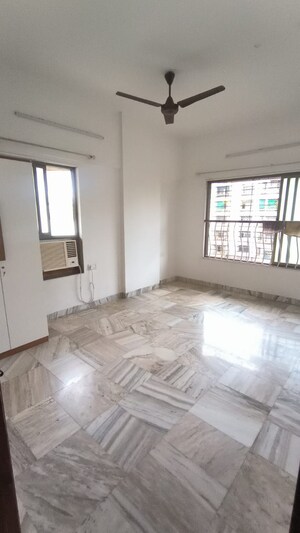 Room in 2 BHK Apartment at Sanghvi Aaditya Heights, Tardeo – for Rent