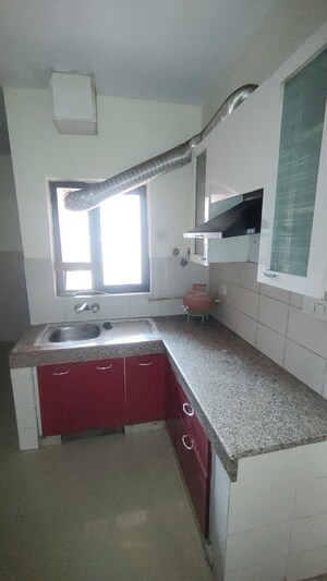 Kitchen in 4 BHK Apartment at Logix Blossom County, Sector 137 – for Rent