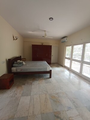 Bedroom in 6+ BHK Independent House at Garden Homes, Halasuru – for Rent