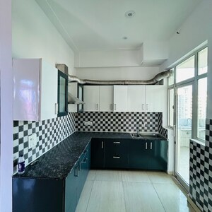Kitchen in 3 BHK Apartment at Gaur Saundaryam, Haibatpur – for Sale