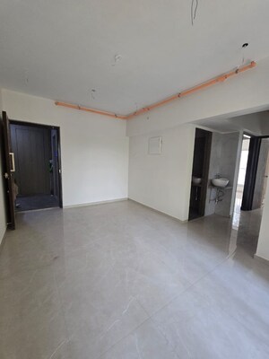 Room in 2 BHK Apartment at Andheri CHS, Andheri West – for Rent