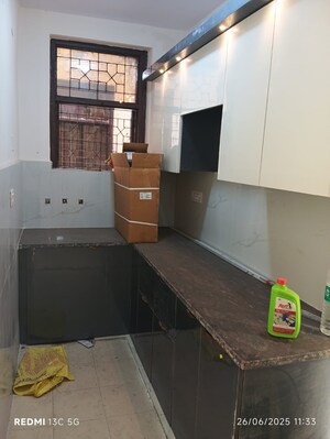 Kitchen in 1.5 BHK Builder Floor at Shalimar Garden – for Sale