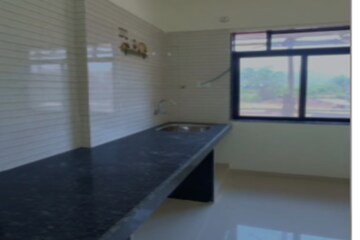 Kitchen in 2 BHK Apartment at Jayram Residency Navi Mumbai, Shedung – for Sale