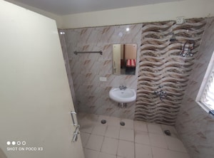 Bathroom in 3 BHK Apartment at UPAVP Bhagirathi Enclave, Raebareli Road – for Rent