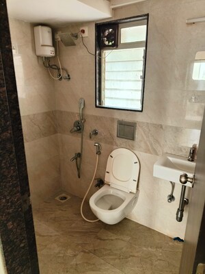 Bathroom in 2 BHK Apartment at Tilak Nagar Building, Tilak Nagar – for Sale