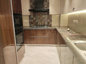 Kitchen in 4 BHK Builder Floor at Nehru Enclave – for Sale