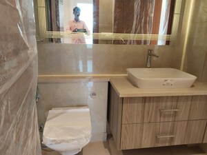 Bathroom in 4 BHK Builder Floor at Nehru Enclave – for Sale