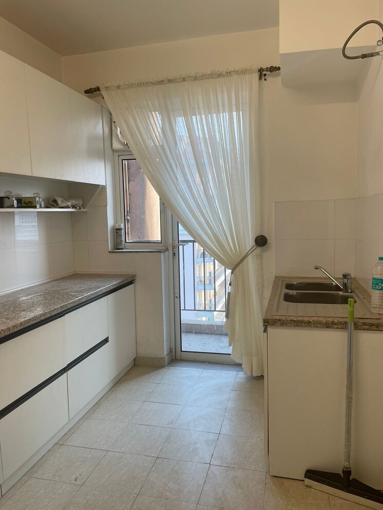 Kitchen, dlf-new-town-heights-iii 3.5 Bedroom 1450 Sq.Ft. Apartment In Sector 91 Gurgaon 9223776