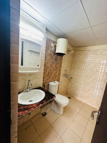 Bathroom in 3 BHK Apartment at Amrapali Silicon City, Sector 76 – for Sale