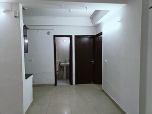 Building Lobby in 2 BHK Apartment at Panchsheel Greens II, Sector 16 Greater Noida – for Sale