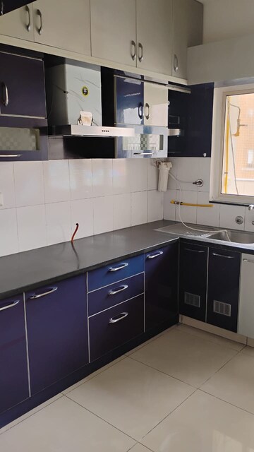 Kitchen in 2.5 BHK Apartment at SNN Raj Serenity, Begur Road – for Rent