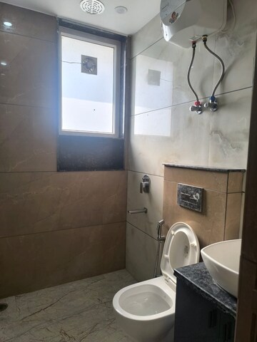 Bathroom in 4 BHK Apartment at Sector 5 Dwarka – for Rent