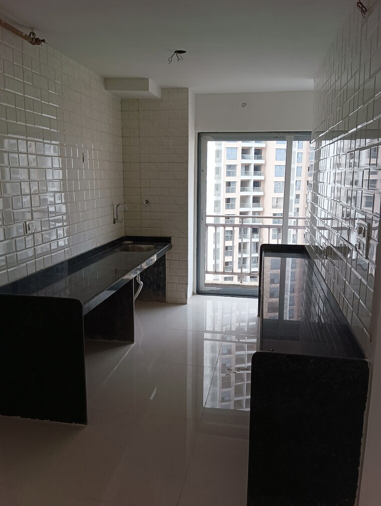 Kitchen, mutha-sai-nirvana 2 Bedroom 1085 Sq.Ft. Apartment In Shahad Thane 9224322