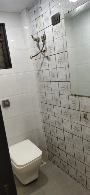 Bathroom in 1 BHK Apartment at Saraswati CHS Kharghar, Kharghar – for Rent