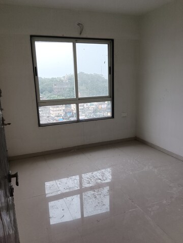 Room in 2 BHK Apartment at Ajmera Crosstown One, Kalyan West – for Rent