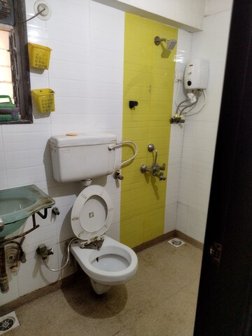 Bathroom in 2 BHK Apartment at M R Galaxy Royale, Goregaon West – for Rent