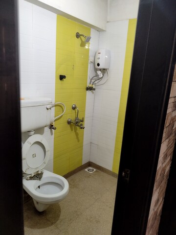 Bathroom in 2 BHK Apartment at M R Galaxy Royale, Goregaon West – for Rent