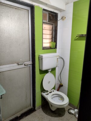 Bathroom in 2 BHK Apartment at M R Galaxy Royale, Goregaon West – for Rent