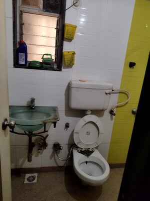 Bathroom in 2 BHK Apartment at M R Galaxy Royale, Goregaon West – for Rent