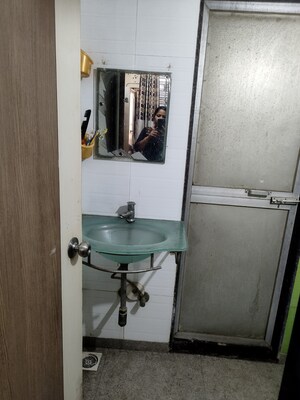 Bathroom in 2 BHK Apartment at M R Galaxy Royale, Goregaon West – for Rent