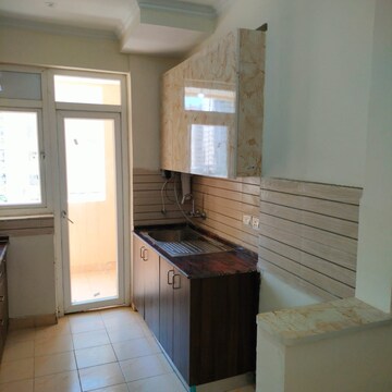 Kitchen in 3 BHK Apartment at Amrapali Crystal Homes, Sector 76 – for Sale