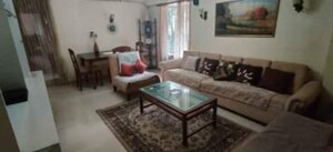 Living Room in 2 BHK Apartment at Andheri CHS, Andheri West – for Rent