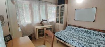 Living Room in 2 BHK Apartment at Andheri CHS, Andheri West – for Rent