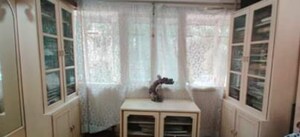 Living Room in 2 BHK Apartment at Andheri CHS, Andheri West – for Rent