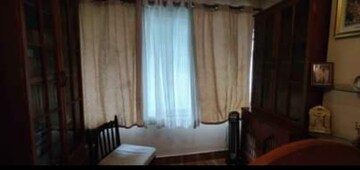 Living Room in 2 BHK Apartment at Andheri CHS, Andheri West – for Rent