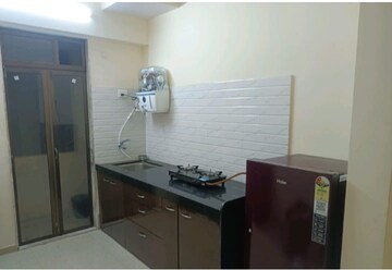Kitchen in 1.5 BHK Apartment at Runwal Garden City, Balkum Pada – for Rent