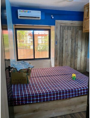 Bedroom in 1.5 BHK Apartment at Runwal Garden City, Balkum Pada – for Rent